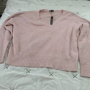 It’s a soft sweater light pink 3x